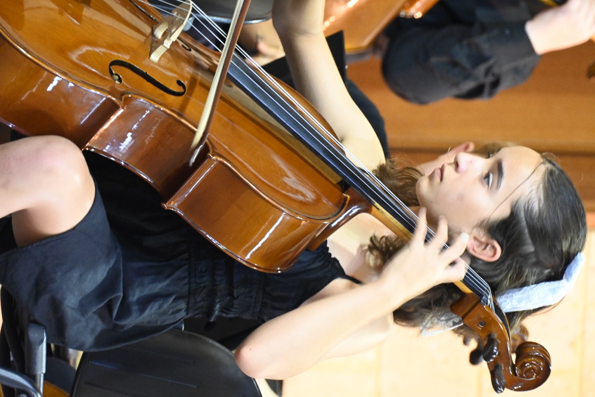 Youth musicians on stage during the 2025 MNCYO concert.